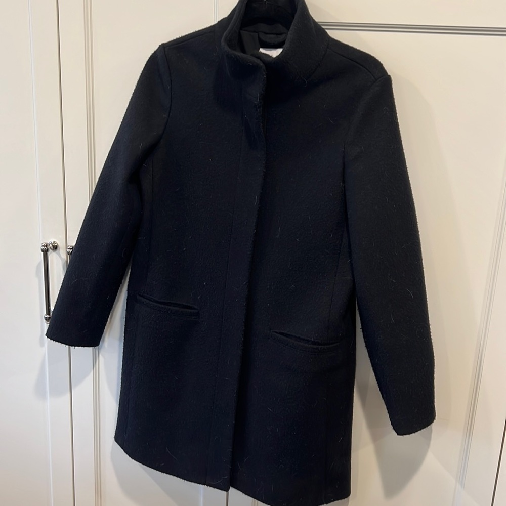 Navy blue peacoat.